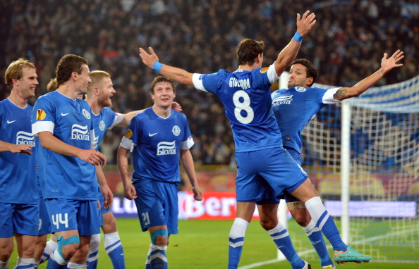 Players of  FC Dnipro celebrate scoring against SSC Napoli during UEFA Europa League, Group F, football match in Dnipropetrovs on October 25, 2012. AFP PHOTO/ SERGEI SUPINSKY        (Photo credit should read SERGEI SUPINSKY/AFP/Getty Images)