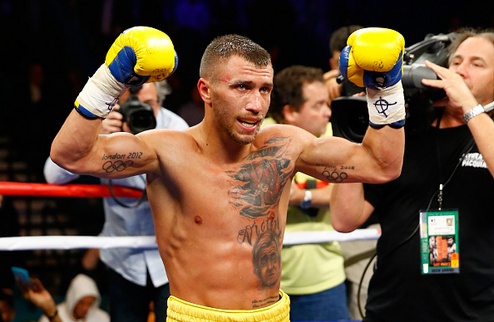 LAS VEGAS, NV - MAY 02: Vasyl Lomachenko celebrates his 9th round knockout of Gamalier Rodriguez during their WBO featherweight championship bout on May 2, 2015 at MGM Grand Garden Arena in Las Vegas, Nevada. (Photo by Al Bello/Getty Images)